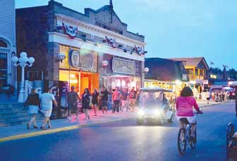 Put-in-Bay Bars & Restaurants - An evening view photo of the main strip on the Put-in-Bay island.